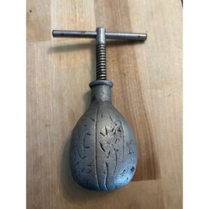 Vintage Hand Held Crank Metal Nut Cracker Etched patina details